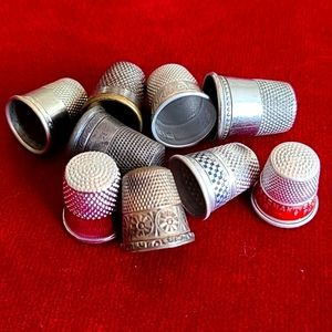 Lot of 9 vintage thimbles